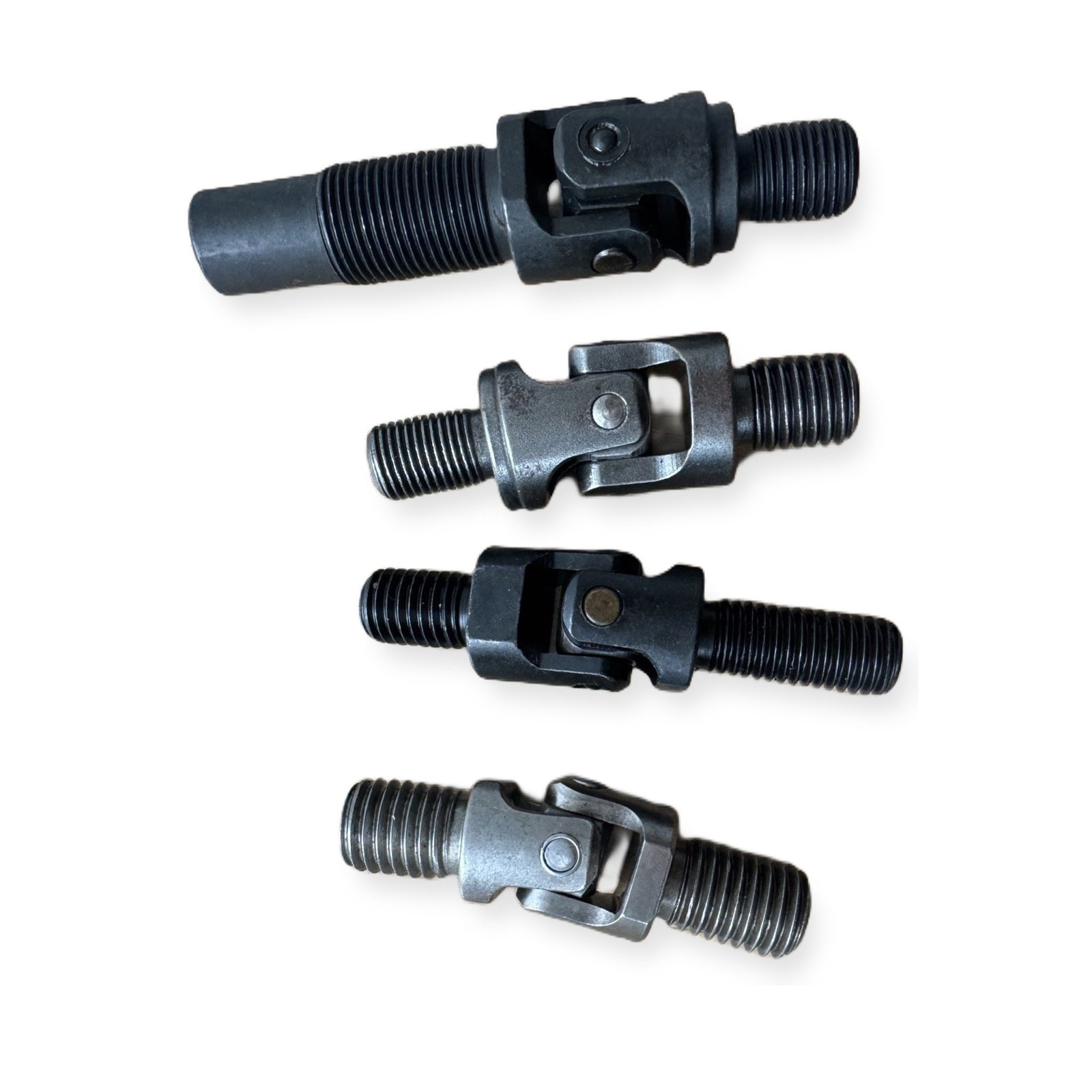 Four universal joint sizes arranged on a white background showing available specification range